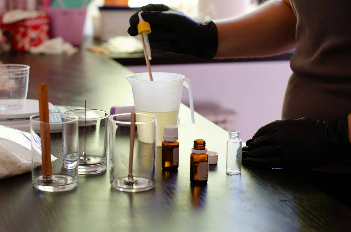 Step-by-step process of making flavor enhancer extract how to make with botanicals in amber jars